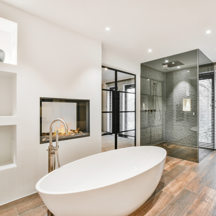 Baignoire îlot et robinetterie sur pied